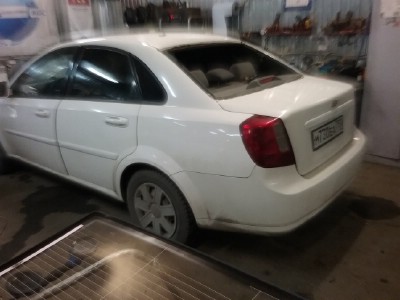 Установка заднего стекла Chevrolet Lacetti 2004-