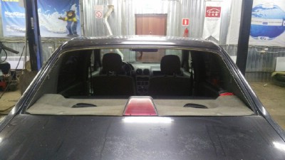 Установка заднего стекла Renault Logan -