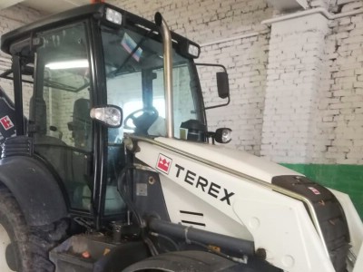 Установка кузовного стекла Terex -